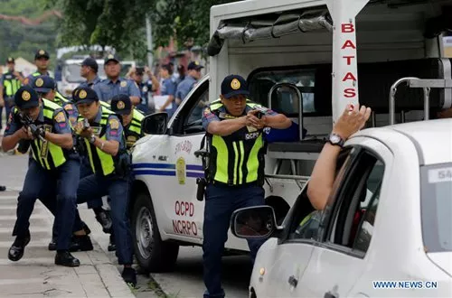 Cảnh sát Philippines tiêu diệt 4 người Trung Quốc nghi bắt cóc - Ảnh 1. Cảnh sát Philippines tiêu diệt 4 người Trung Quốc nghi bắt cóc - Ảnh 1.
