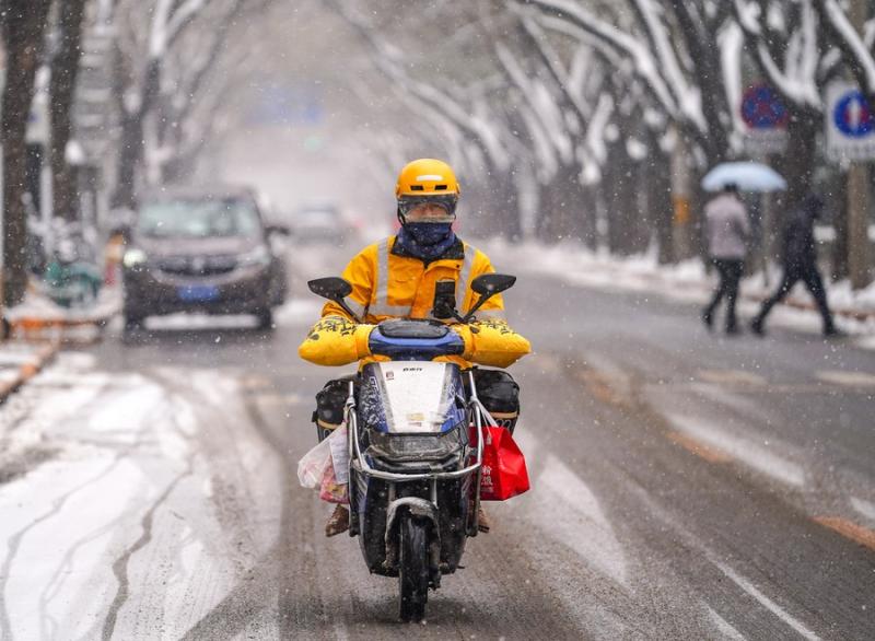 Tuyết rơi ở Bắc Kinh, ngày 13.12.2023. Ảnh: Xinhua